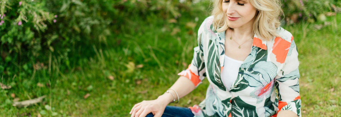 breathwork and eczema - woman on grass breathing