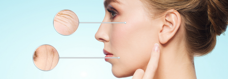 woman pointing at ear with 2 circles showing dehydrated skin and fine lines