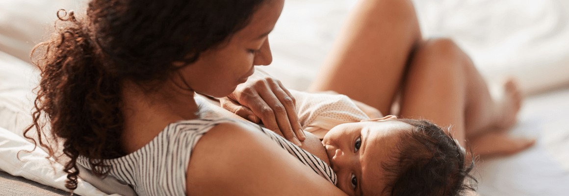 Breast Milk and Eczema - woman breastfeeding her baby