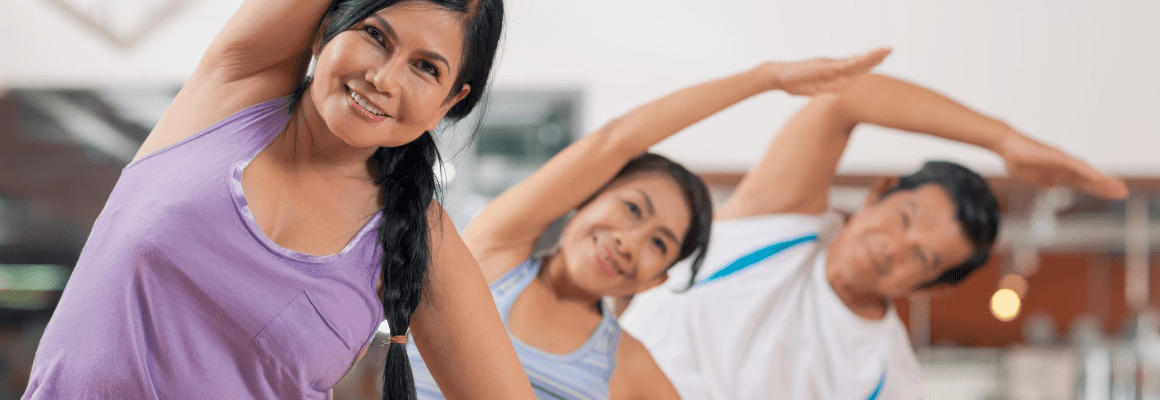 Exercise with Eczema - people stretching in gym class