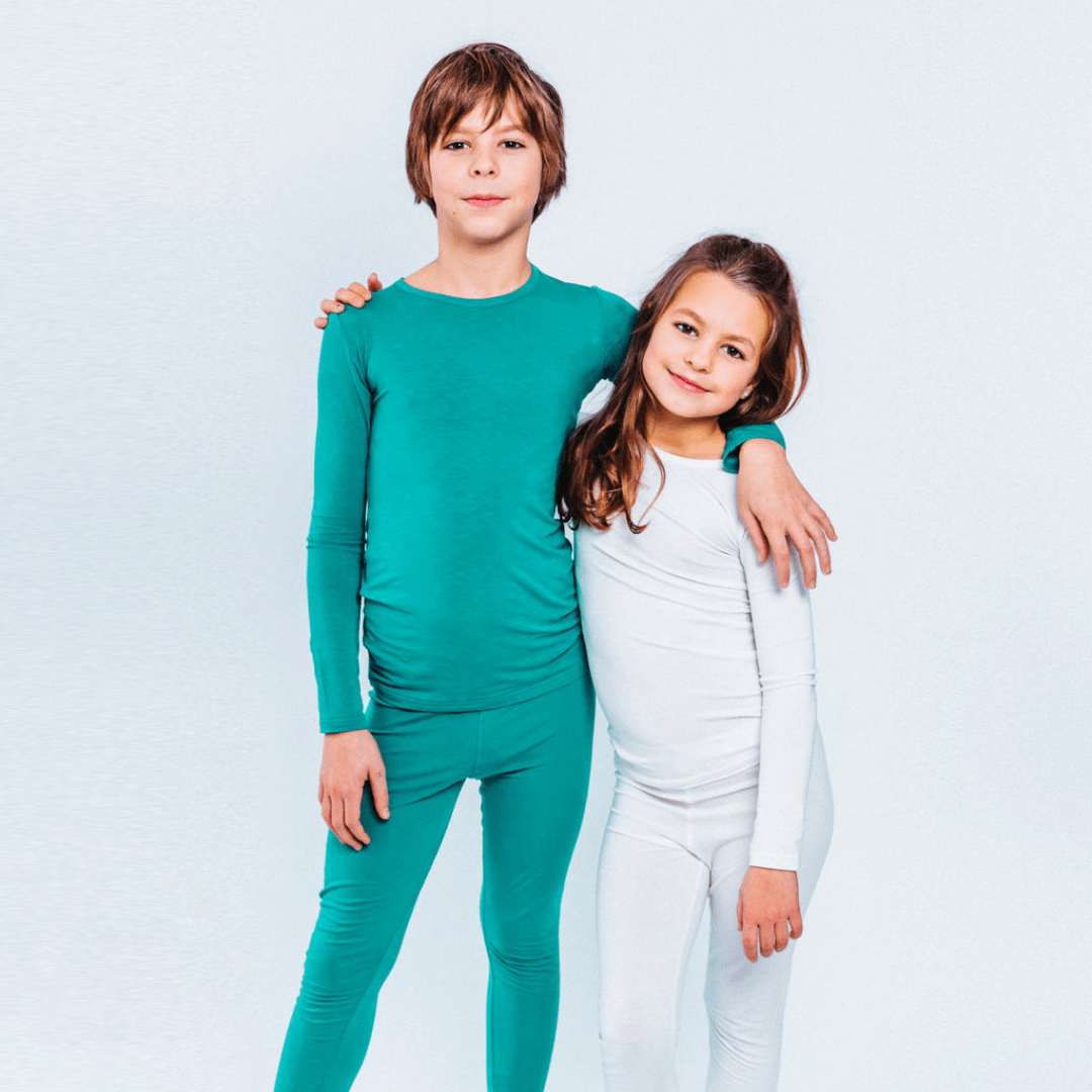 Girl and Boy in Remedywear - Our Fabric