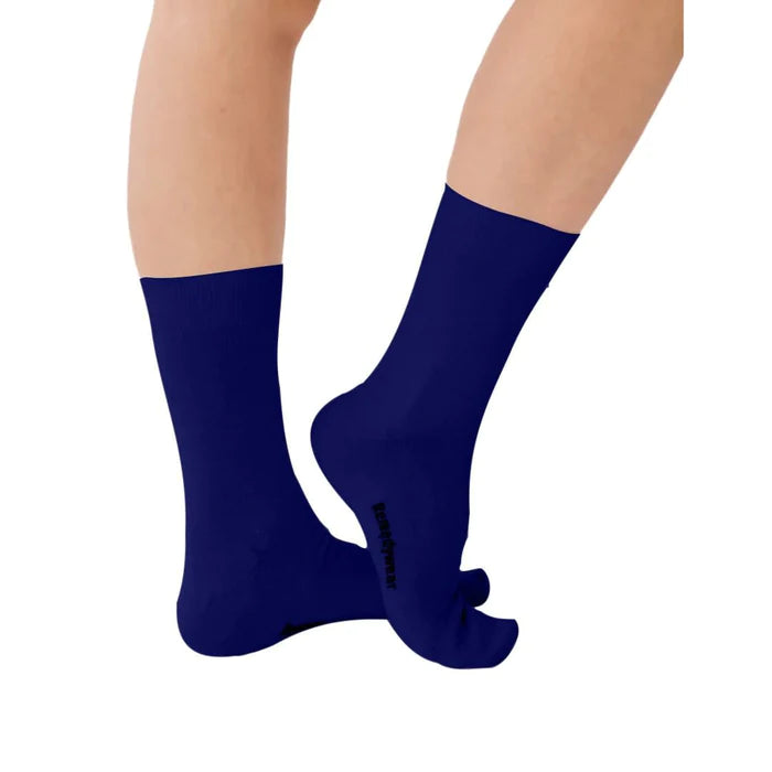 Pair of navy blue Remedywear socks for eczema on a white background.